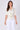 Ivory satin tie front short sleeve top angled side view
