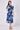 Navy blue floral print tie front midi shirt dress angled front view