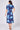Navy blue floral print midi shirt dress back view